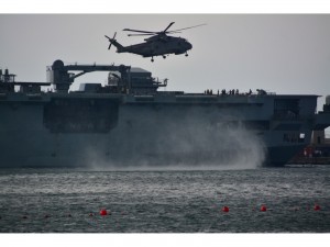 Gibraltar - 4th December 2015 A Merlin helicopter lands on HMS Ocean whilst berthed at the z-berth at Gibraltar's naval base.
