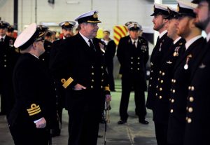 Pictured is HMS VICTORIOUS Stbd ceremonial divisions, marking her role transition from HMS VANGUARD (Port). The divisions were conducted at the HMNB Clyde Offsie Centre, attending VIPs were Mr Michael Powell (Prime Warden) and The Revd Gordon Warren, Hon RN; both of the Worshipful Company of Gold and Silver Wyre Drawers, who have long had a close affiliation with HMS VICTORIOUS.  and Commodore Michael Walliker OBE, Commodore Faslane Flotilla (COMFASFLOT).