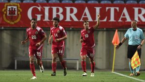 Gibraltar's midfielder Liam Walker (R) celebrates after scoring the equalizer during the WC 2018 football qualification match between Gibraltar and Greece at the Algarve stadium in Faro September 6, 2016. / AFP / FRANCISCO LEONG        (Photo credit should read FRANCISCO LEONG/AFP/Getty Images)